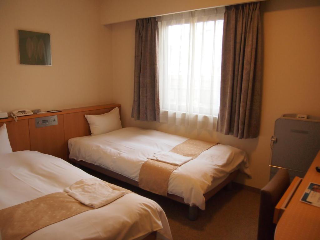 Nest Hotel Kumamoto Camera foto
